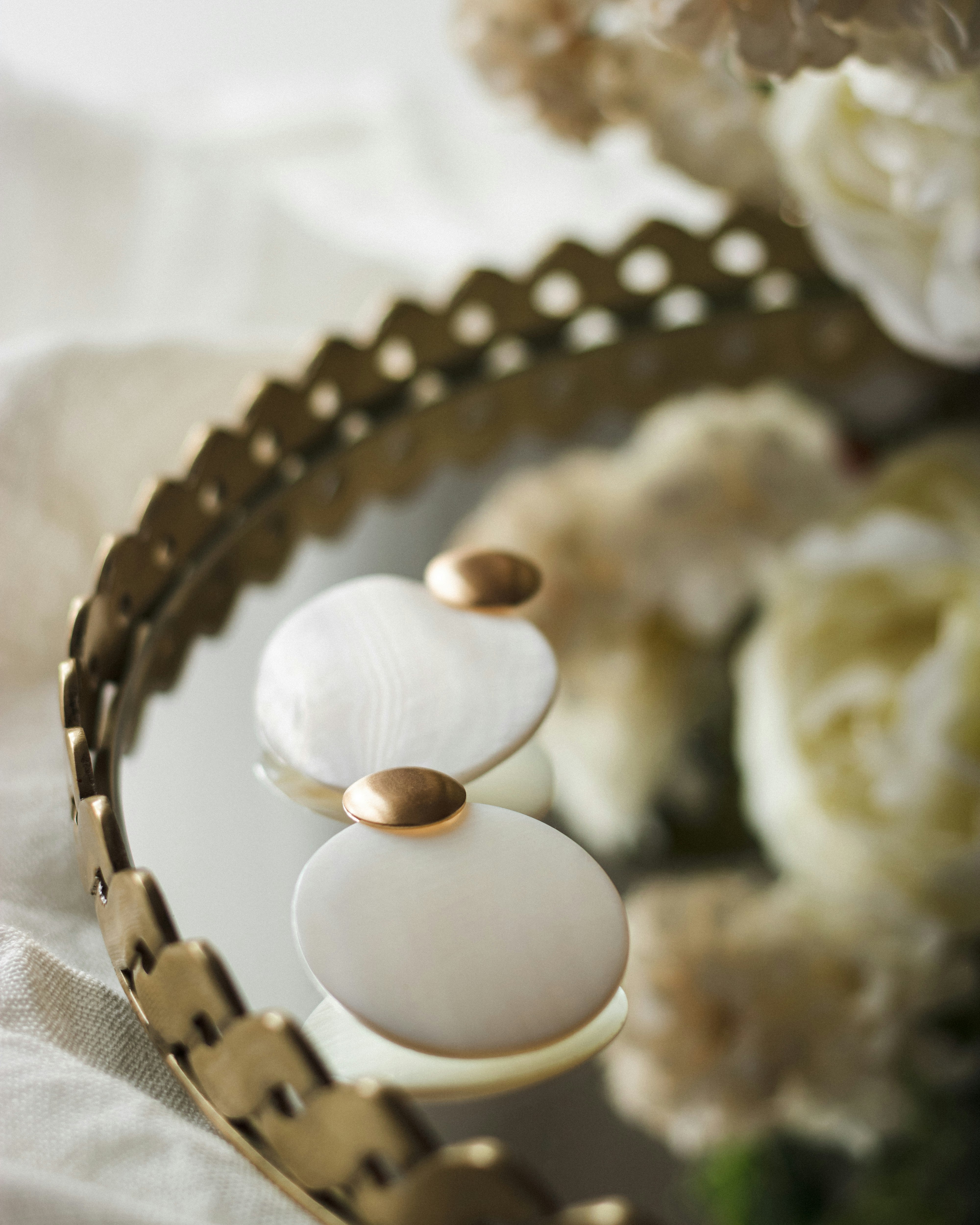 white and gold round decor